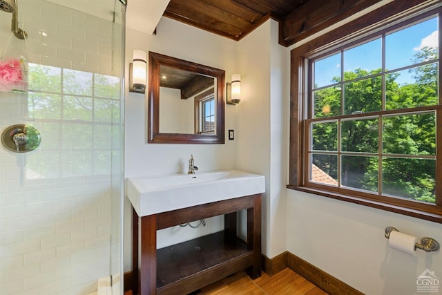 bathroom with wood ceiling, walk in shower, a healthy amount of sunlight, and wood-type flooring