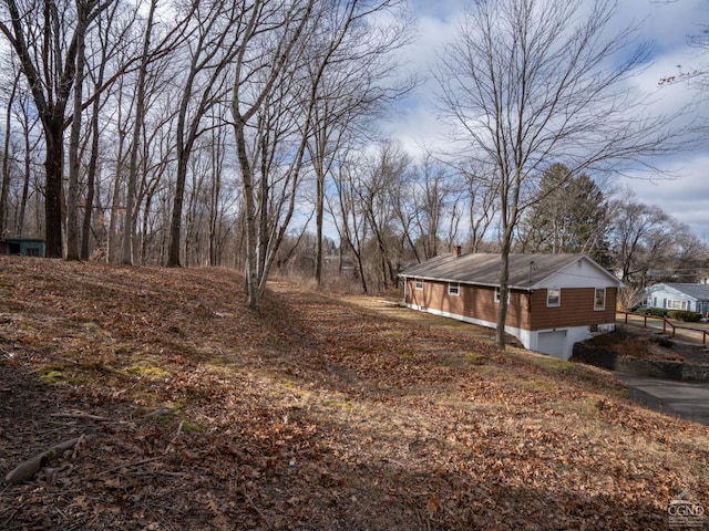 view of yard with a garage