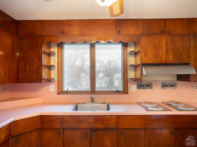 kitchen featuring sink and white electric cooktop