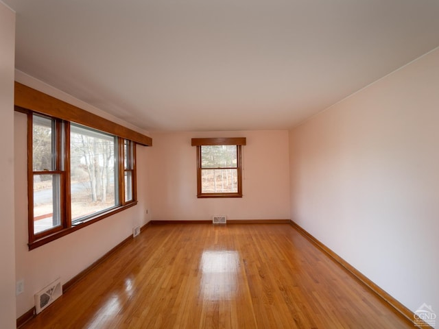 empty room featuring light hardwood / wood-style floors