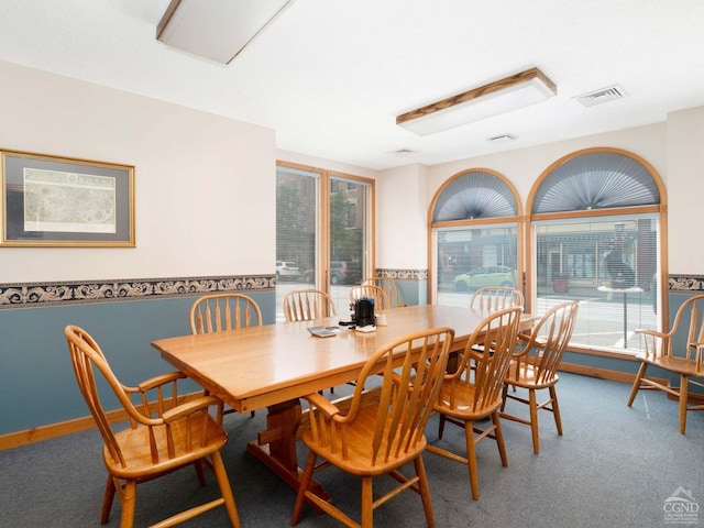 view of carpeted dining room