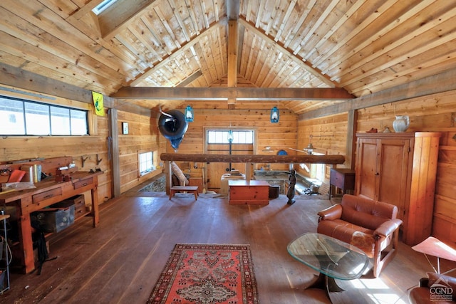 interior space with lofted ceiling, wooden ceiling, and wood walls