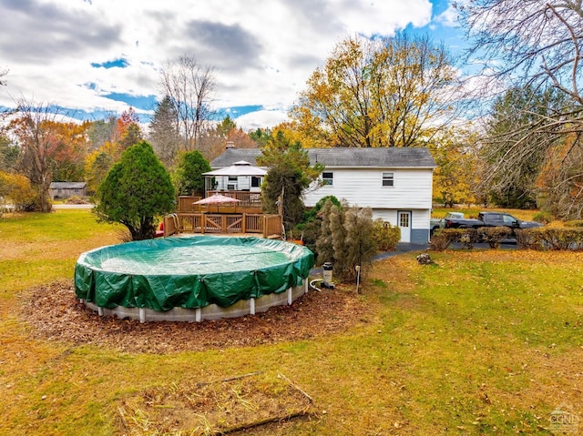 view of yard featuring a pool side deck