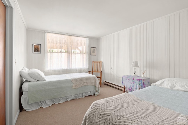 bedroom featuring baseboard heating, carpet floors, and crown molding