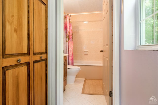 bathroom with tile patterned floors, a textured ceiling, shower / tub combo, and toilet