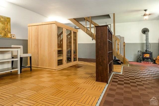 interior space featuring a wood stove