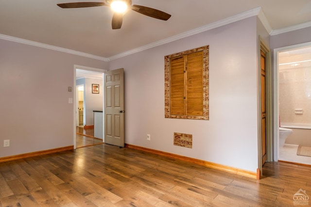 unfurnished bedroom featuring hardwood / wood-style flooring, ceiling fan, ornamental molding, and connected bathroom