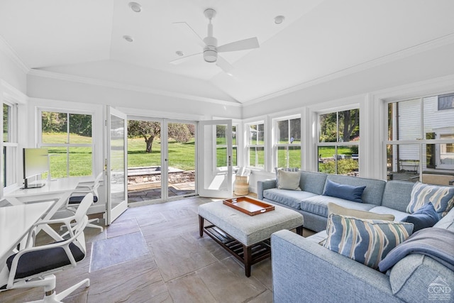 sunroom featuring a wealth of natural light, ceiling fan, and vaulted ceiling