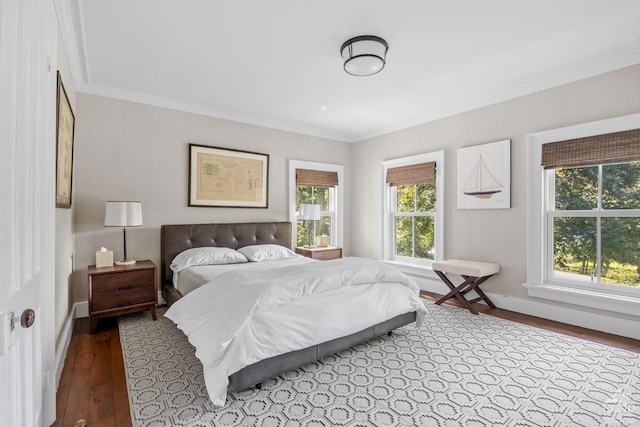 bedroom with light hardwood / wood-style flooring and ornamental molding