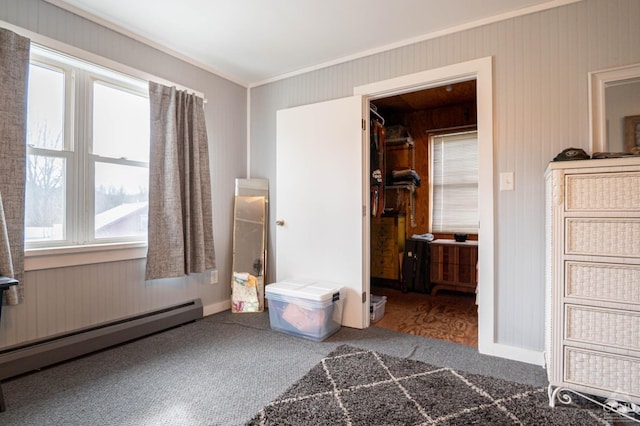 bedroom featuring carpet floors, a baseboard radiator, crown molding, and multiple windows