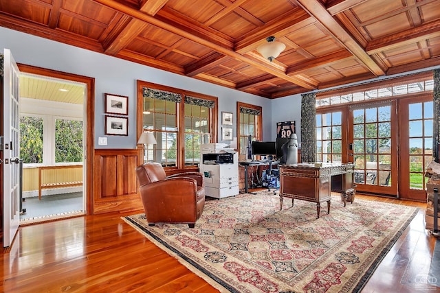 office area with hardwood / wood-style flooring, wood ceiling, french doors, and a healthy amount of sunlight