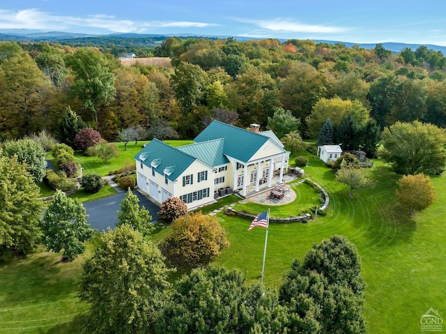 bird's eye view featuring a forest view