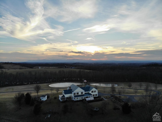 aerial view at dusk with a rural view