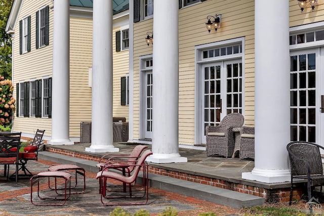 view of patio / terrace with covered porch and french doors