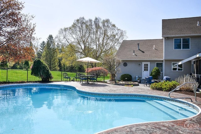 view of pool featuring a fenced in pool, a patio area, and fence