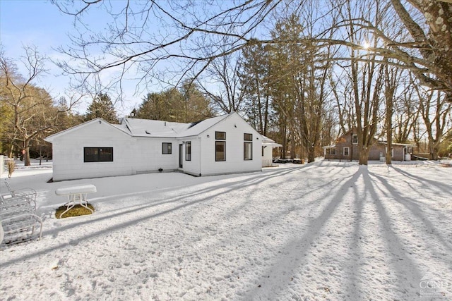 view of snow covered property