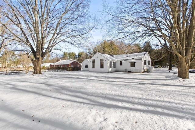 view of front of home with fence