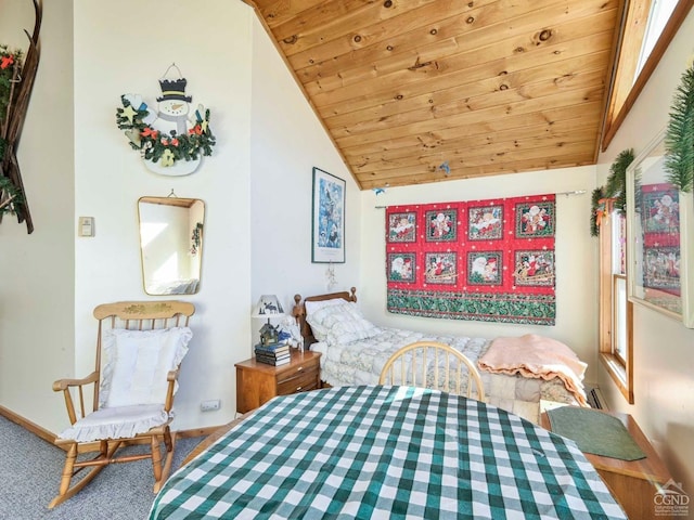 bedroom with carpet floors, wooden ceiling, and vaulted ceiling