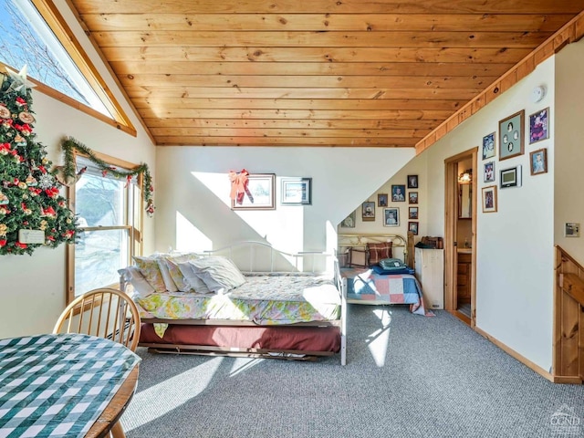 carpeted bedroom featuring ensuite bathroom, wood ceiling, and vaulted ceiling