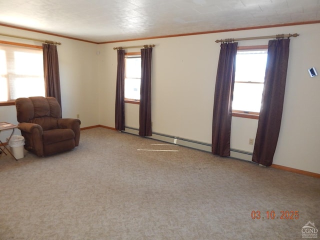 unfurnished living room with crown molding, plenty of natural light, baseboards, and carpet floors