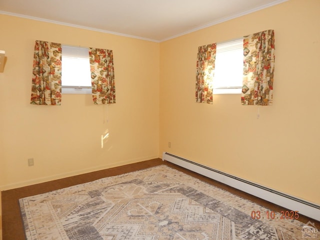 unfurnished room featuring crown molding, baseboards, and baseboard heating