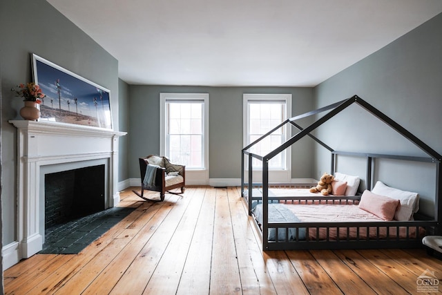 bedroom with hardwood / wood-style flooring