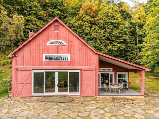 view of outbuilding featuring french doors