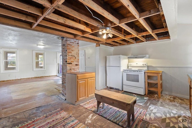 kitchen featuring extractor fan and white appliances