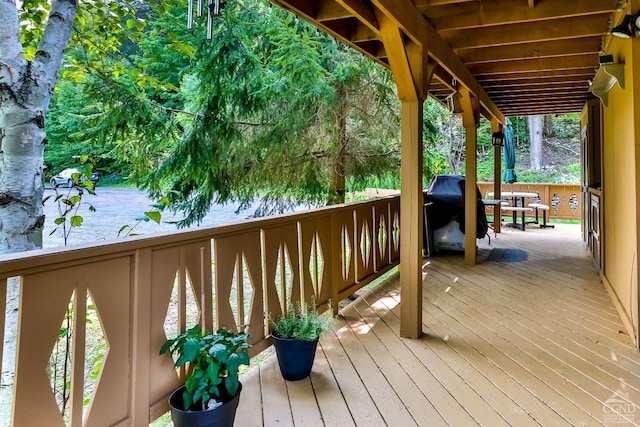 wooden terrace with grilling area