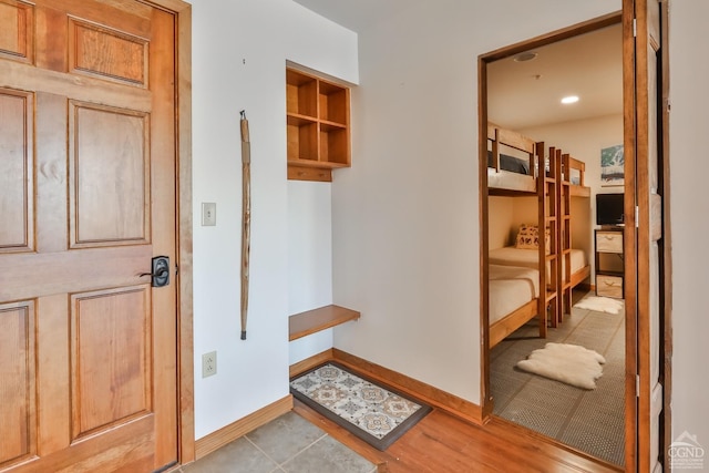 hallway with light wood-type flooring