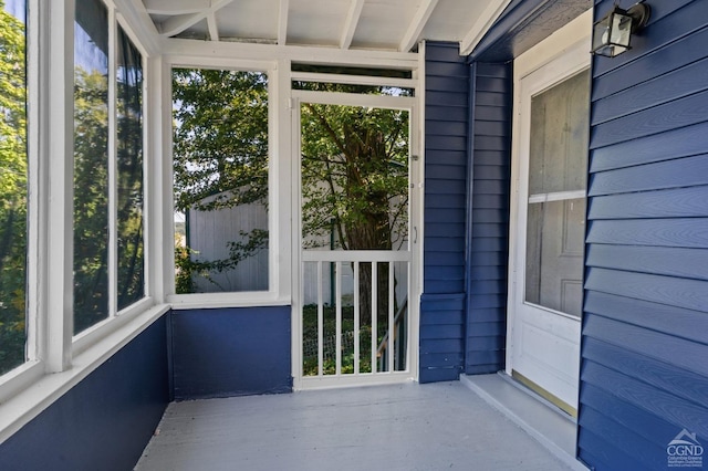 unfurnished sunroom with a healthy amount of sunlight