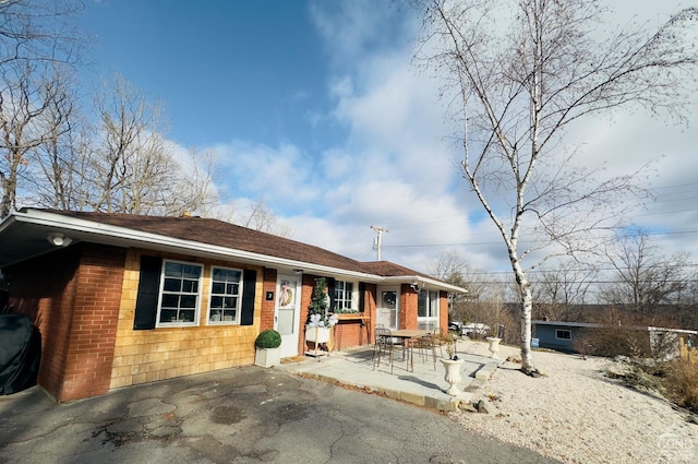 single story home with a patio