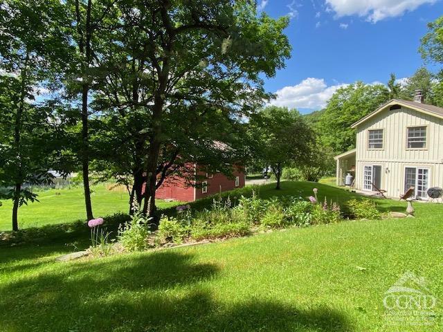 view of yard featuring french doors