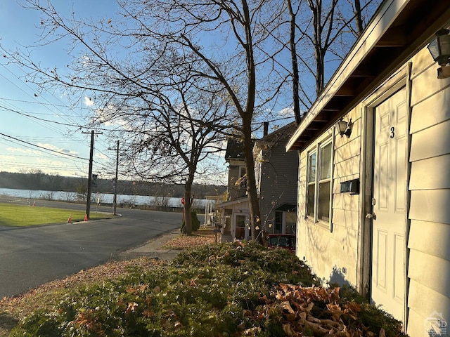 exterior space featuring a water view