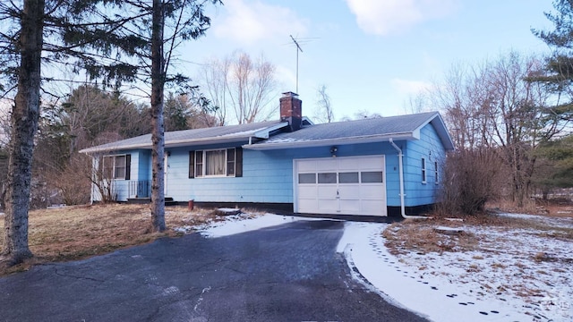 single story home with a garage