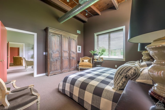 bedroom featuring carpet, beamed ceiling, wooden ceiling, and high vaulted ceiling