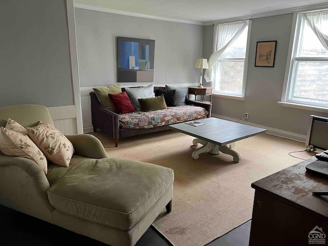 carpeted living room with crown molding