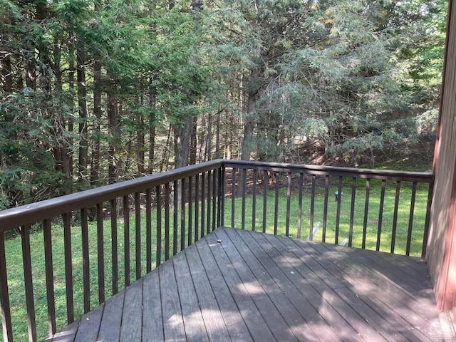 wooden deck with a yard