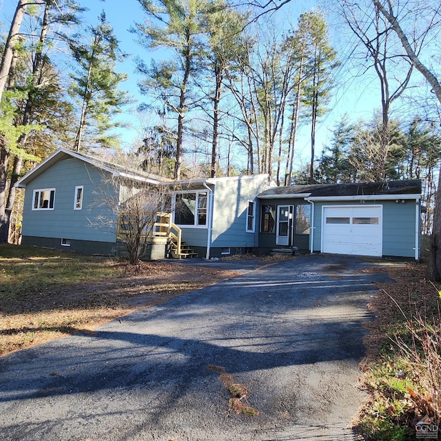 view of front of property featuring a garage