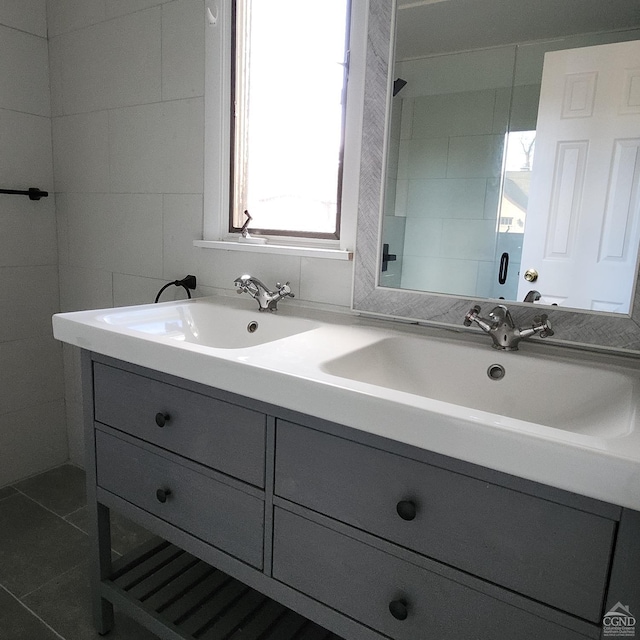 bathroom with vanity and tile patterned floors