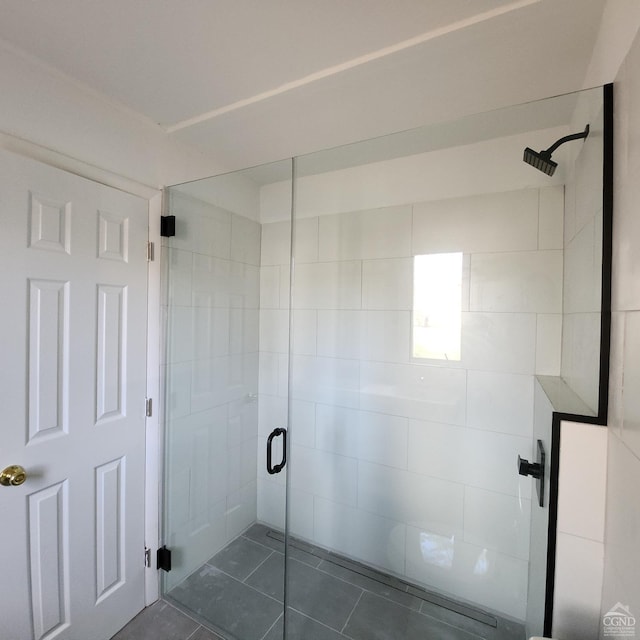 bathroom featuring tile patterned floors and walk in shower