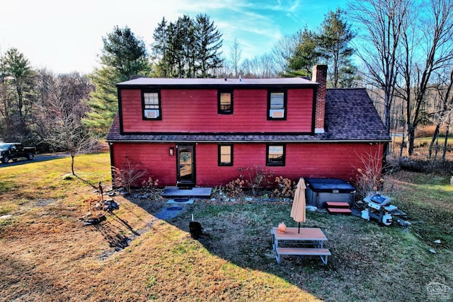 view of front of property with a front lawn