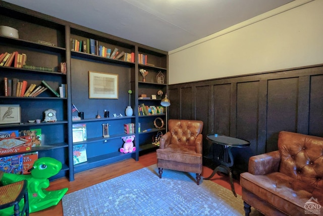 sitting room featuring light wood-type flooring