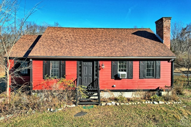 view of front facade with cooling unit