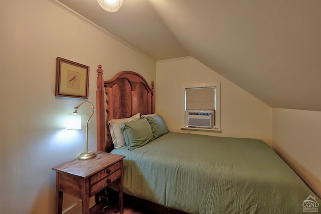 bedroom with cooling unit, vaulted ceiling, and ornamental molding