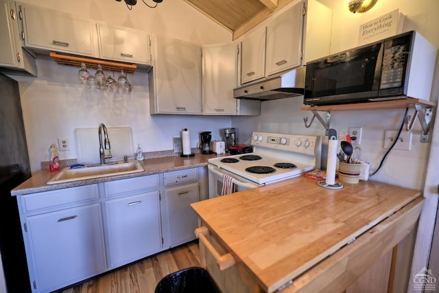 kitchen with light wood-type flooring, white electric range, and sink