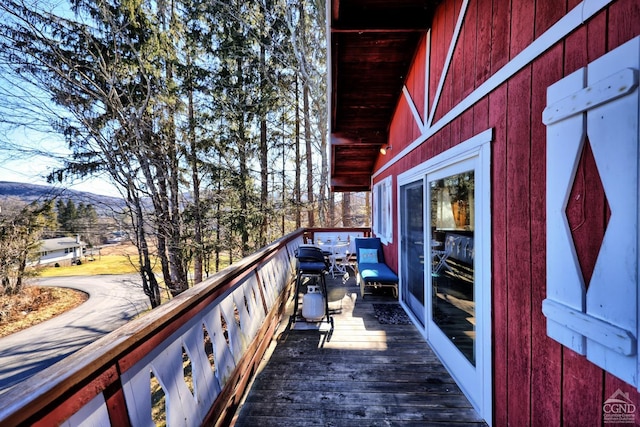 exterior space featuring a mountain view and grilling area