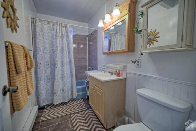 full bathroom with tile patterned flooring, vanity, toilet, and shower / bath combo with shower curtain