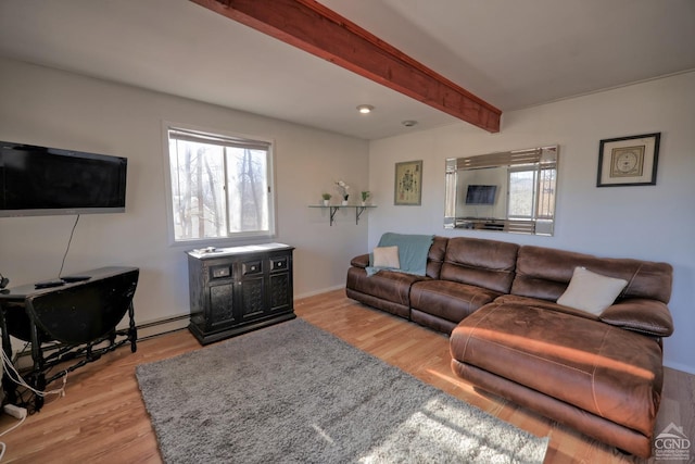 living room with beam ceiling and light hardwood / wood-style floors