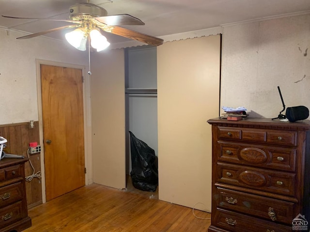 bedroom featuring ceiling fan and light hardwood / wood-style flooring